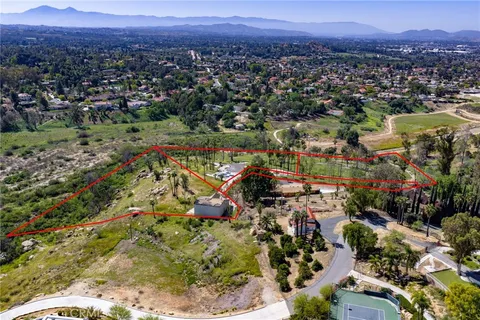 a view of a city with mountains in the background