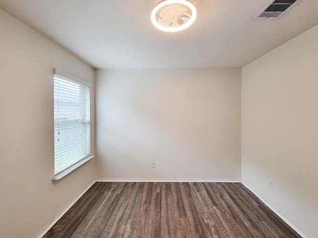 an empty room with a window