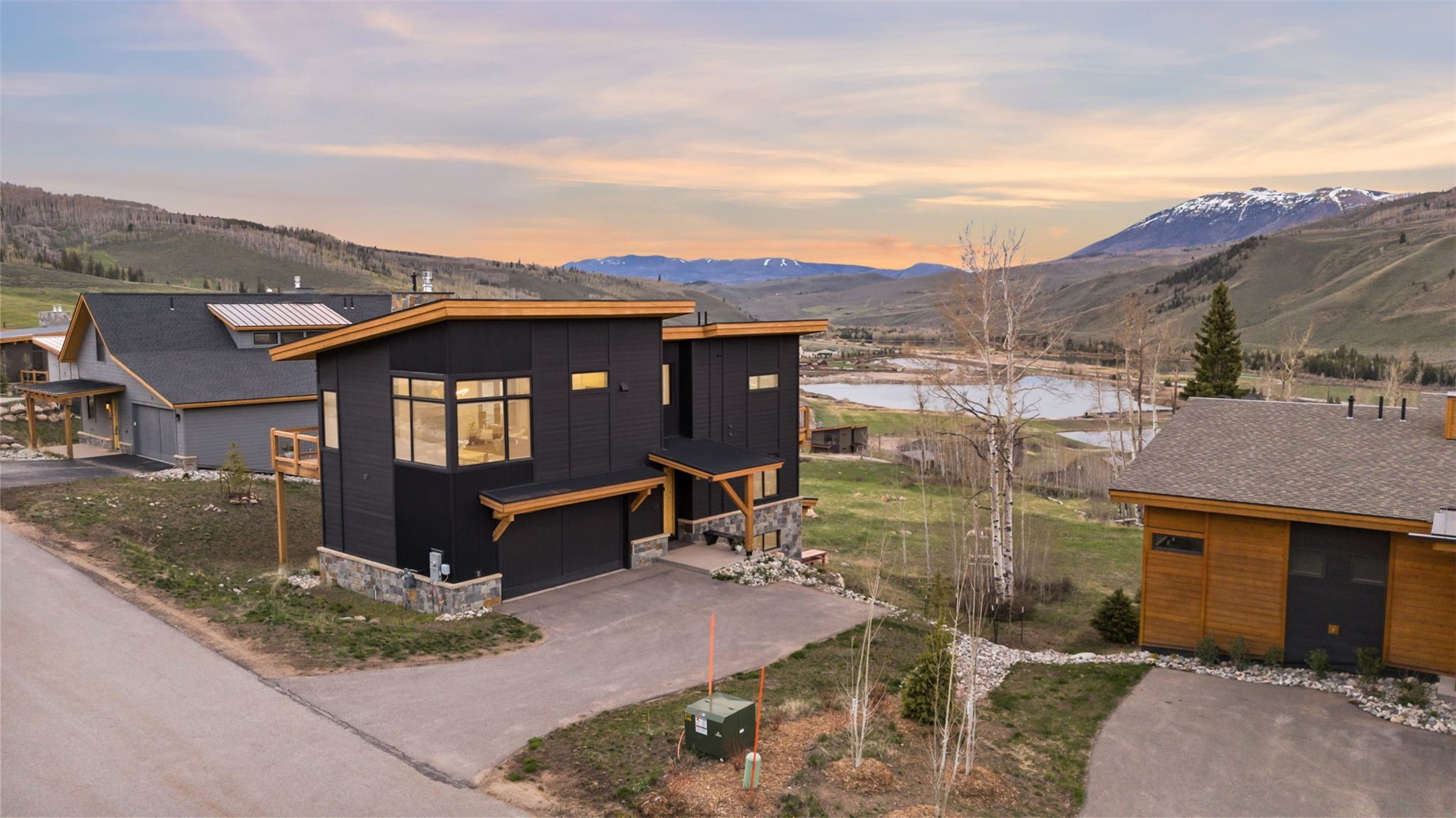 57 Beasley Road Silverthorne, CO 80498 - Photo 32 of 39 View of front of home featuring water and mountain views
