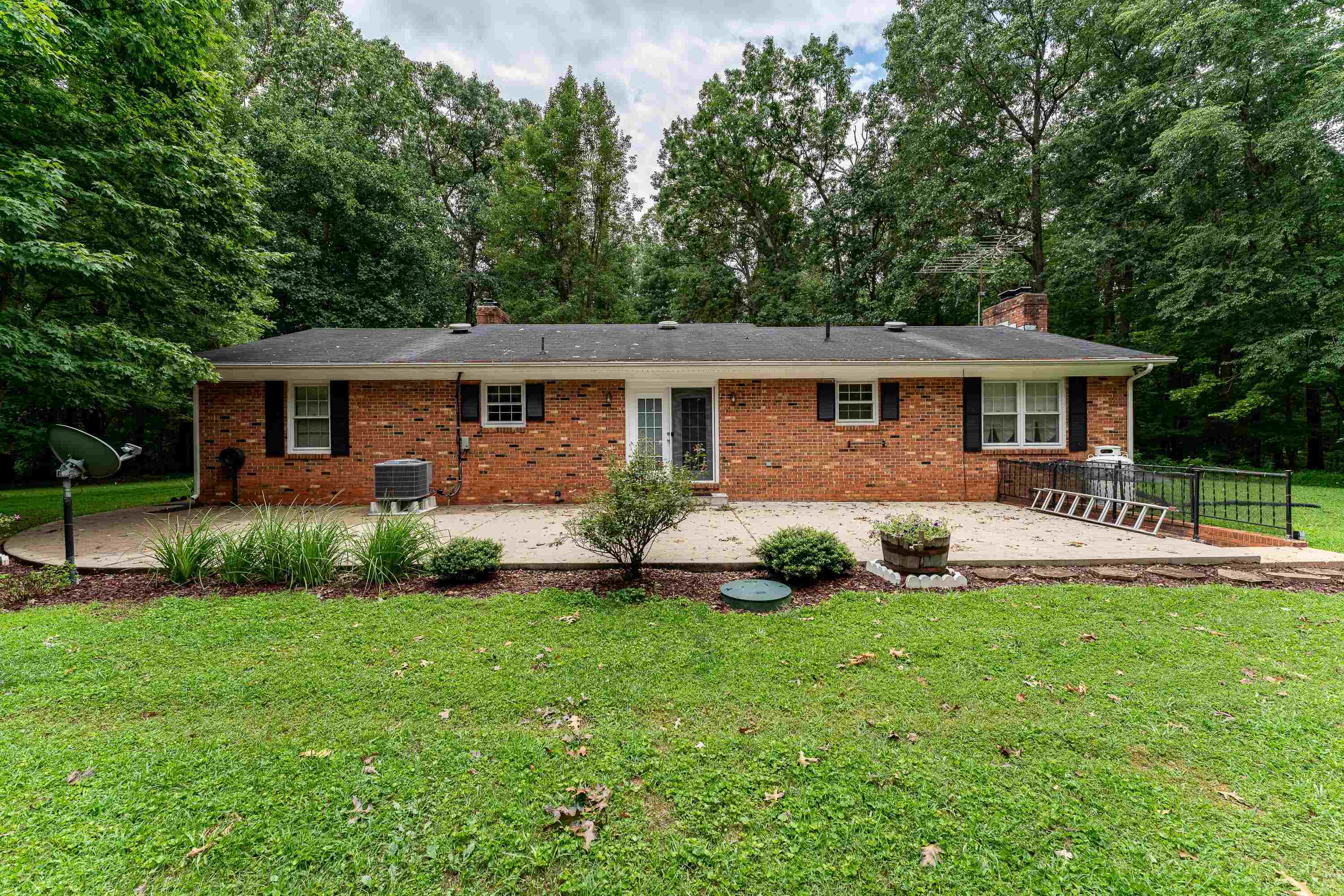 431 Springfield Estates Drive Rileyville, VA 22650 - Photo 26 of 44 a front view of a house with a yard and porch