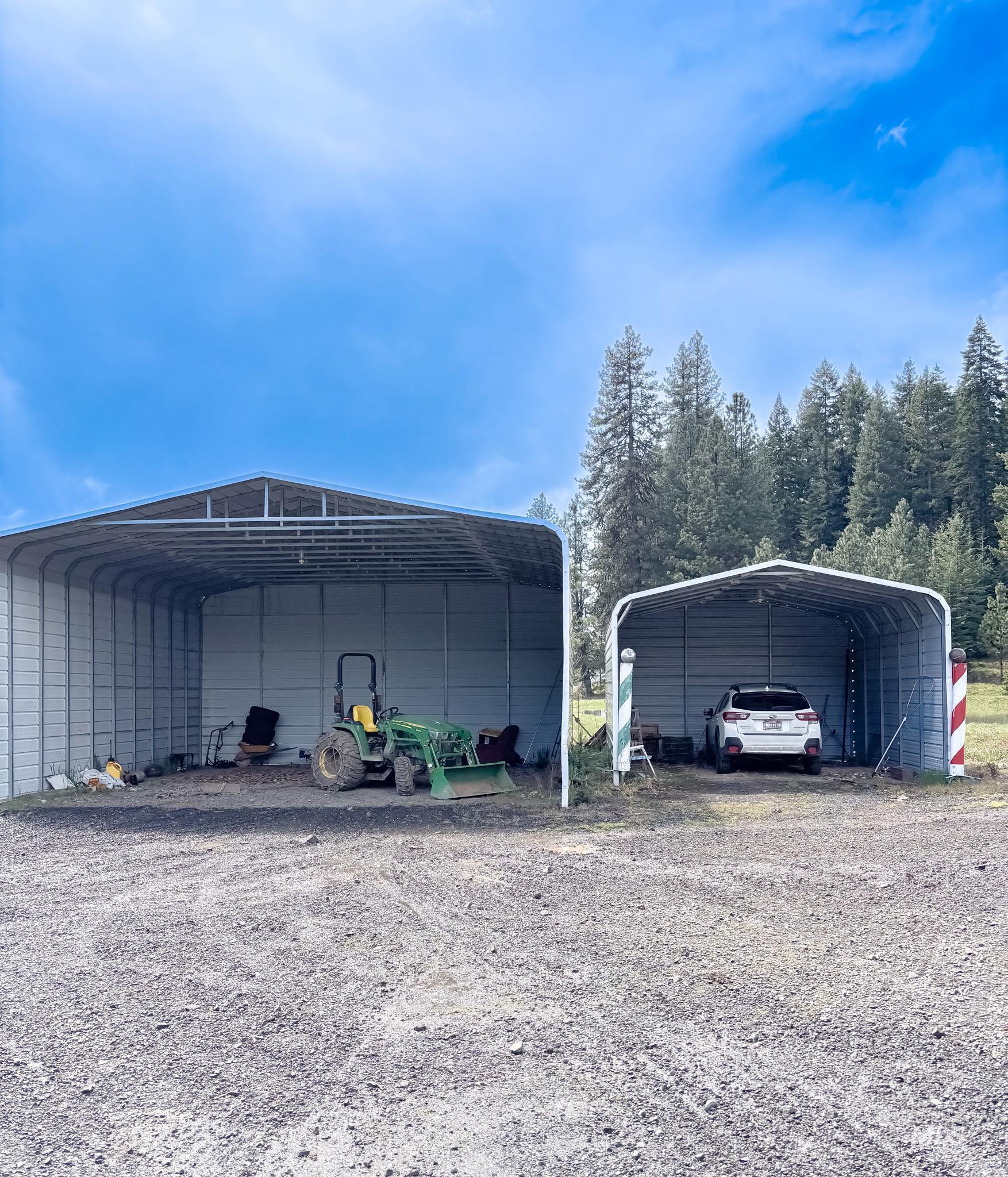 1995 Glenwood Road Kamiah, ID 83536 - Photo 27 of 38 Two open-sided metal carports providing covered parking