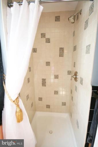 8907 Bradford Road Silver Spring, MD 20901 - Photo 12 of 30 ALL NEW ITALIAN GLASS ENCLOSED SHOWER