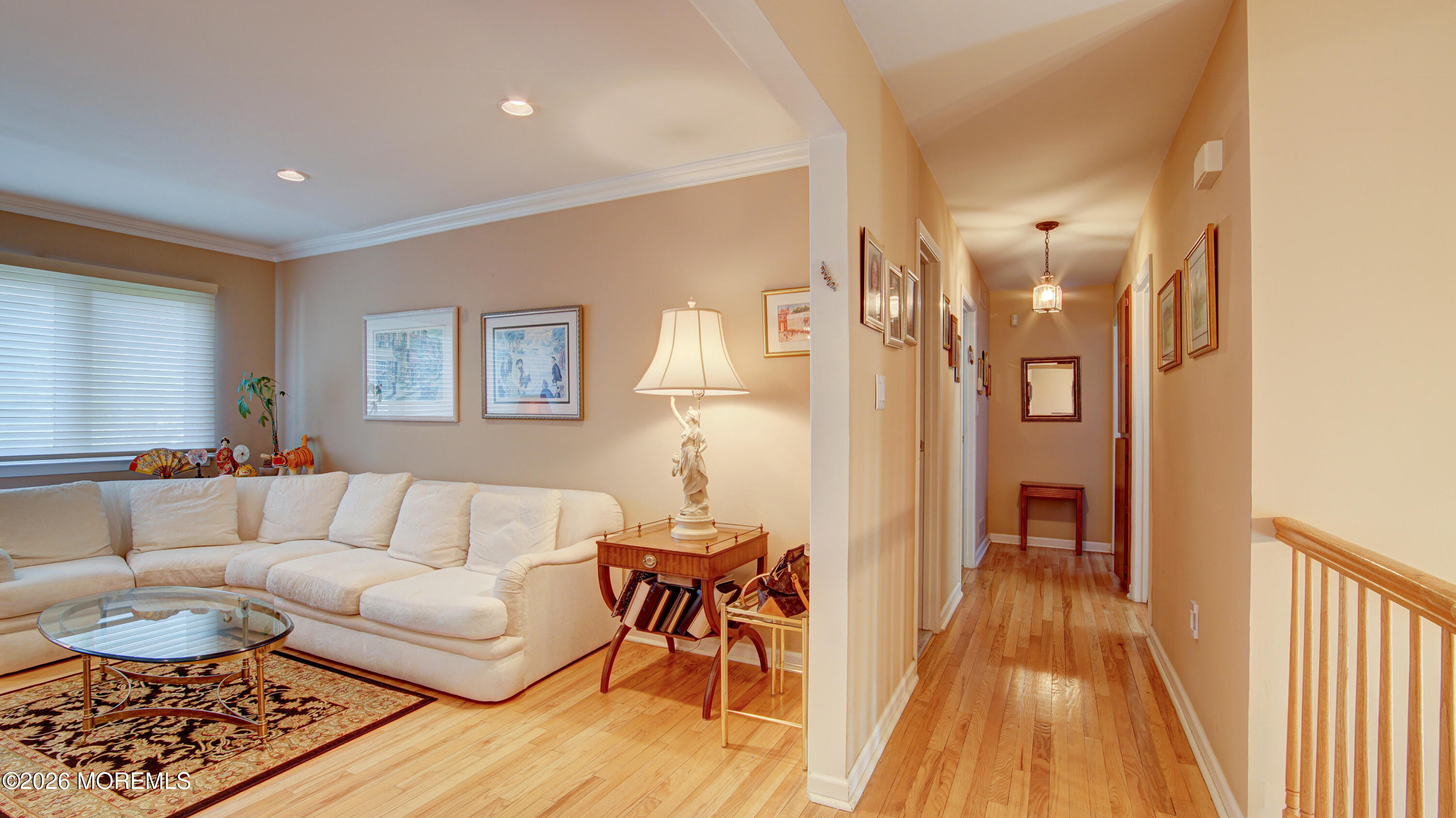 12 Cavan Lane Hazlet, NJ 07730 - Photo 11 of 34 a living room with furniture and a wooden floor
