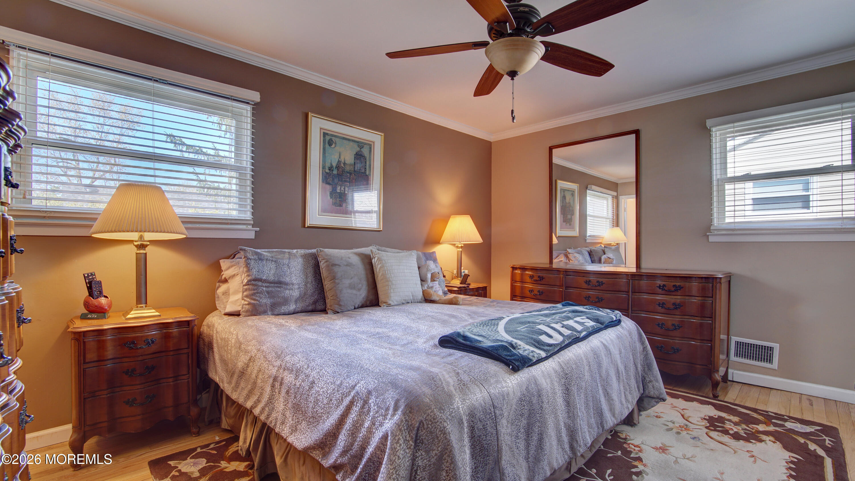 12 Cavan Lane Hazlet, NJ 07730 - Photo 12 of 34 a bedroom with a bed and wooden floor