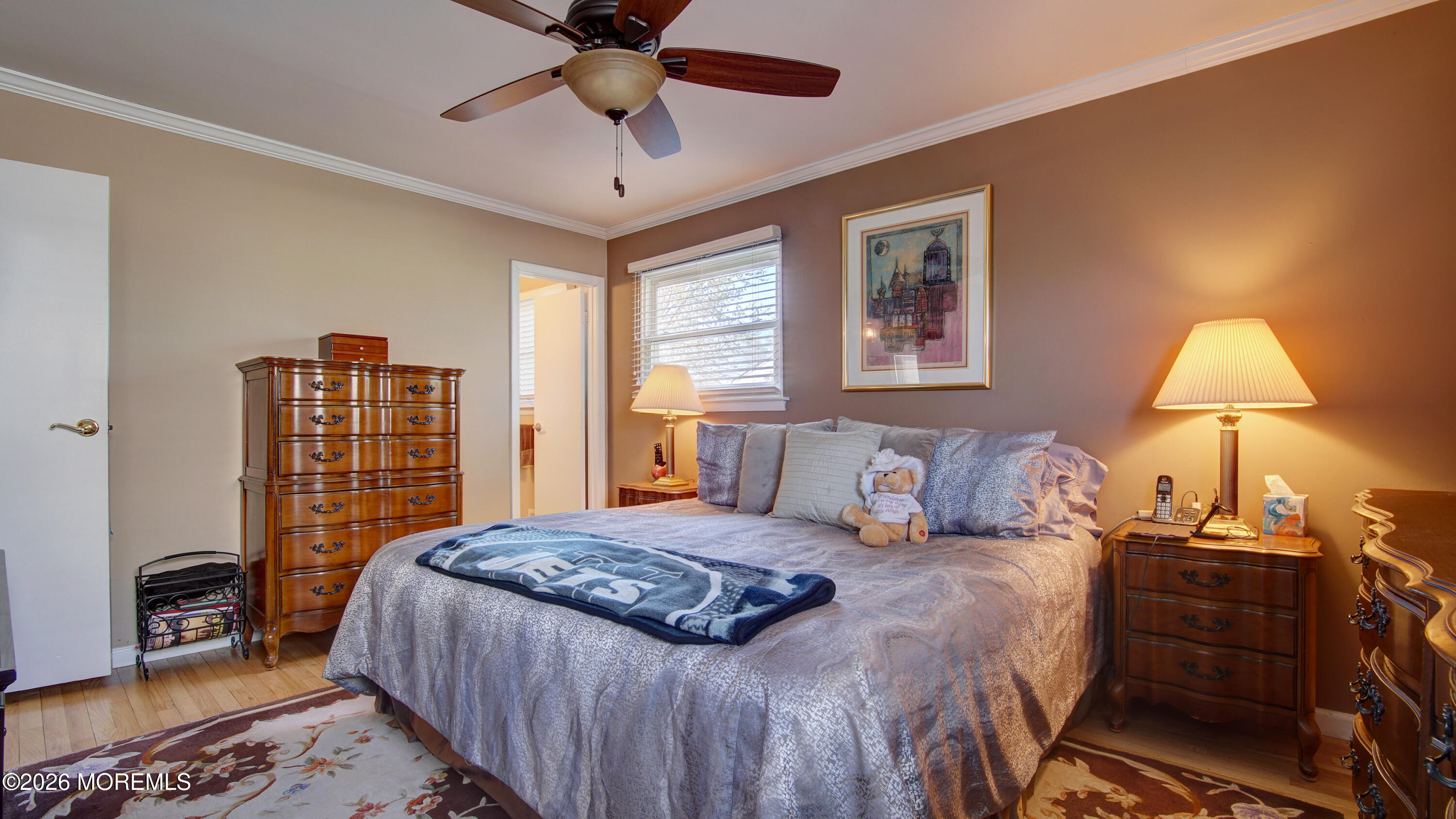 12 Cavan Lane Hazlet, NJ 07730 - Photo 13 of 34 a bedroom with a large bed and a lamp