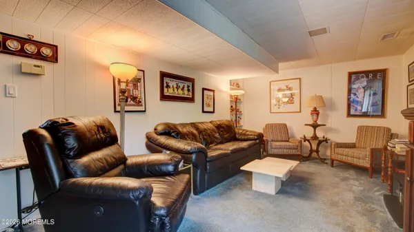 a living room with furniture and a couch