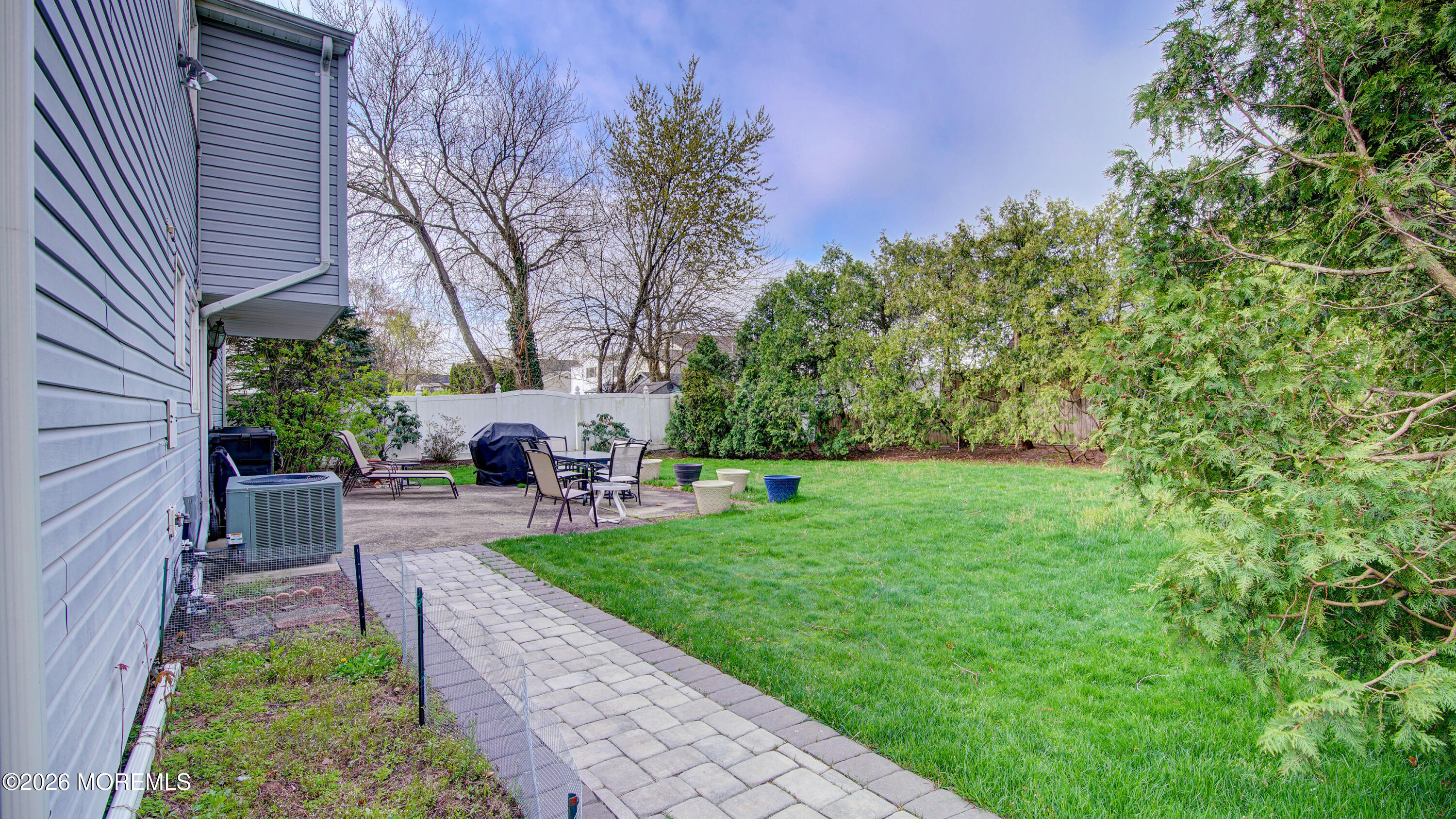 12 Cavan Lane Hazlet, NJ 07730 - Photo 31 of 34 a view of a house with a backyard