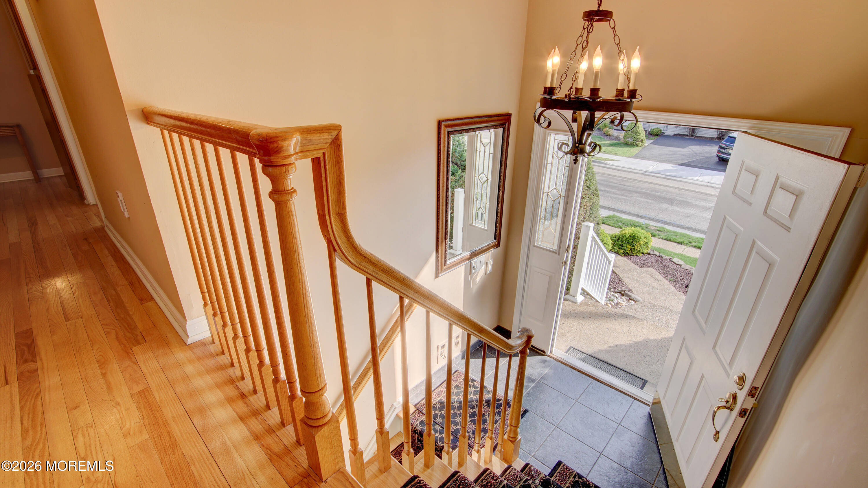 12 Cavan Lane Hazlet, NJ 07730 - Photo 4 of 34 a view of staircase with railing and a chandelier
