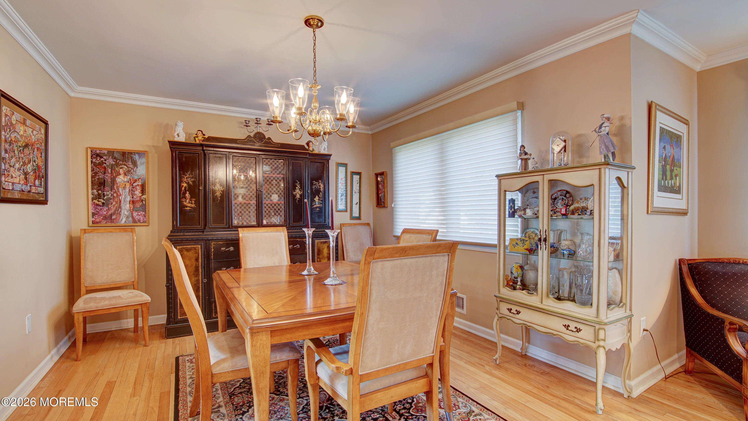 12 Cavan Lane Hazlet, NJ 07730 - Photo 9 of 34 a view of a dining room with furniture and chandelier