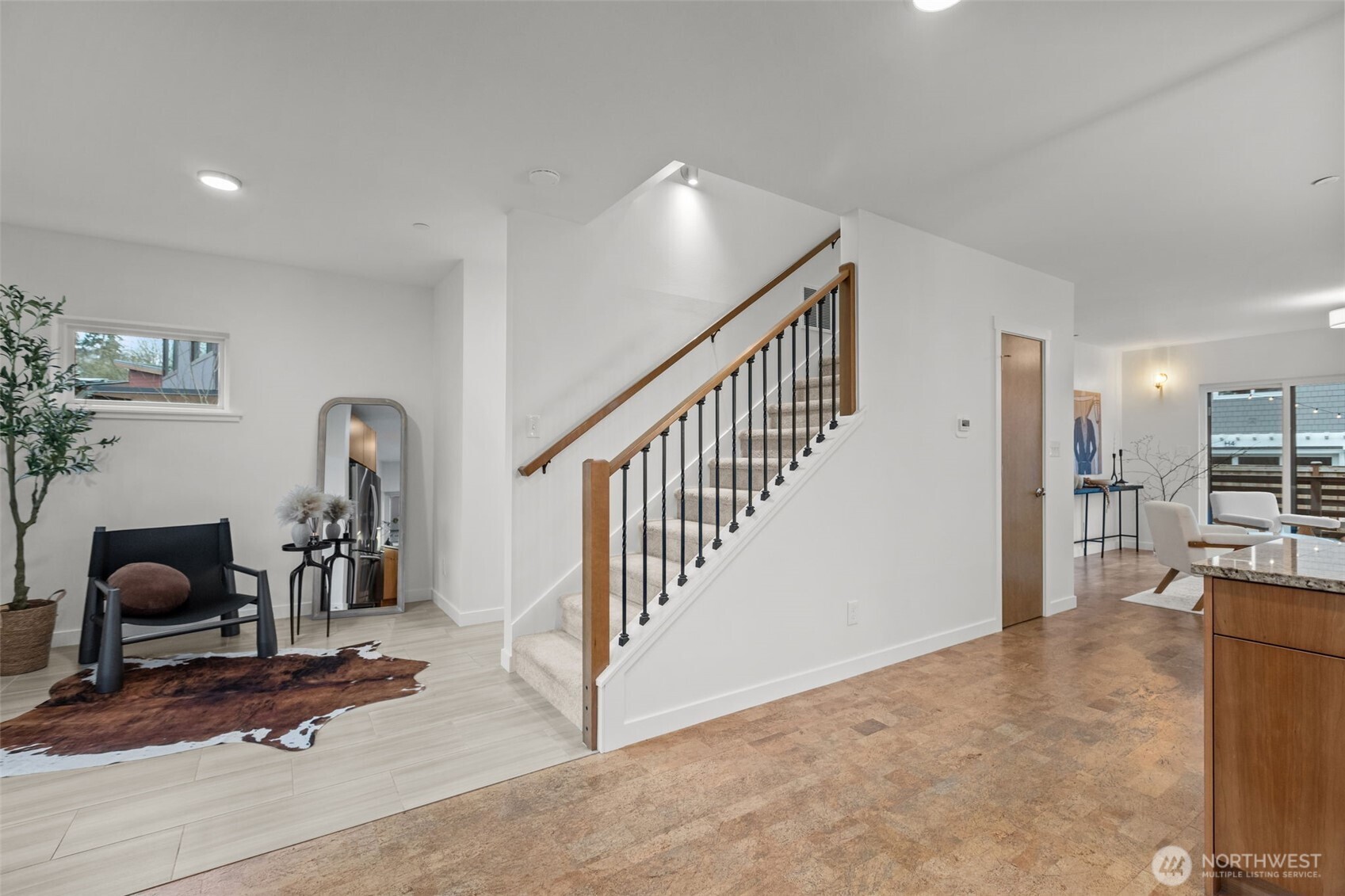 1402 194th Street Southeast, Unit 1 Bothell, WA 98012 - Photo 13 of 31 a view of a livingroom with furniture and entryway