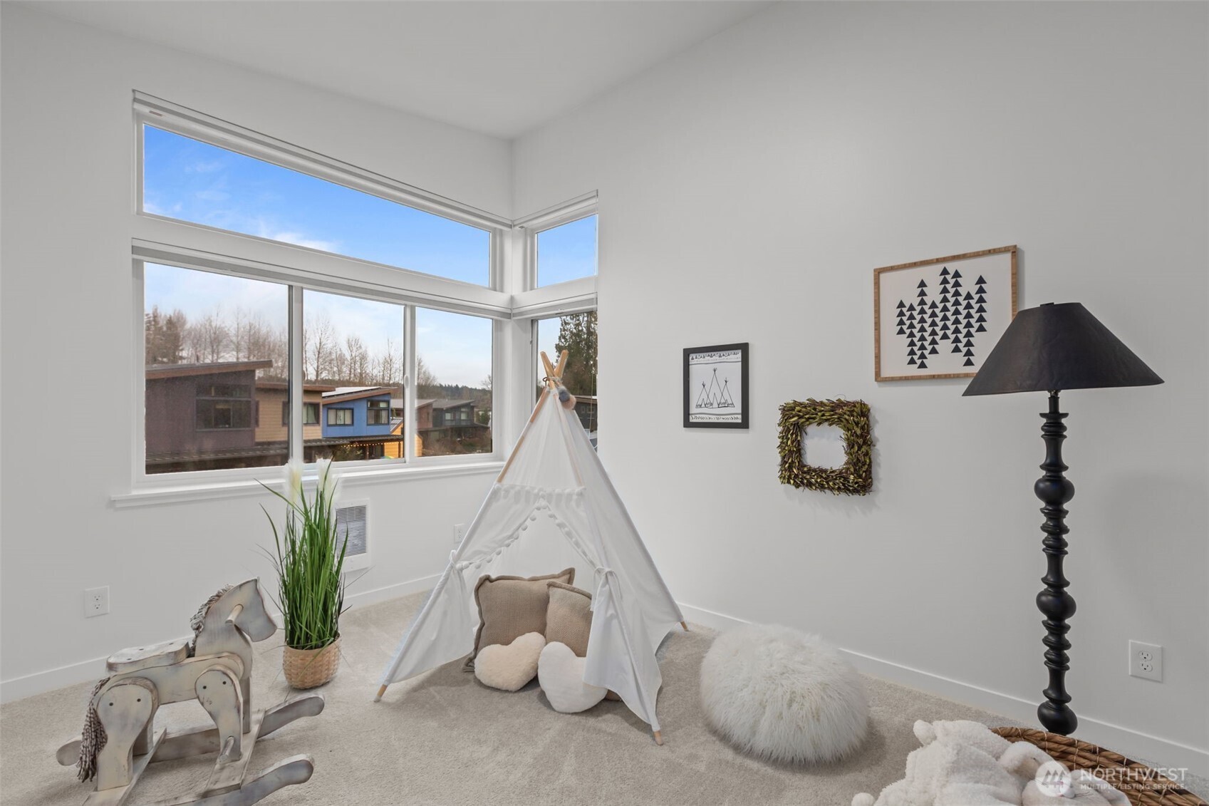 1402 194th Street Southeast, Unit 1 Bothell, WA 98012 - Photo 22 of 31 a living room with furniture and a potted plant