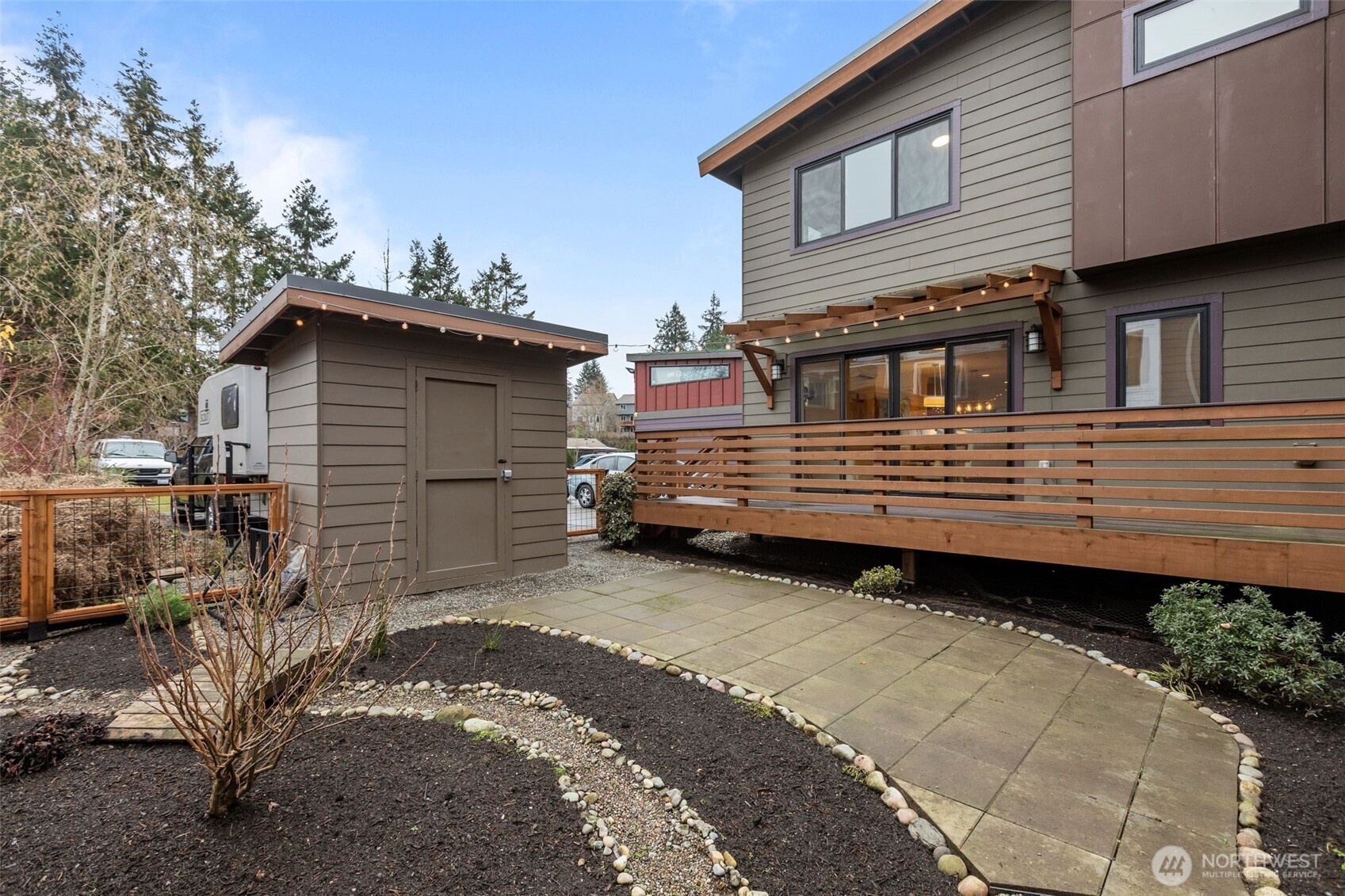 1402 194th Street Southeast, Unit 1 Bothell, WA 98012 - Photo 26 of 31 a view of a house with a yard