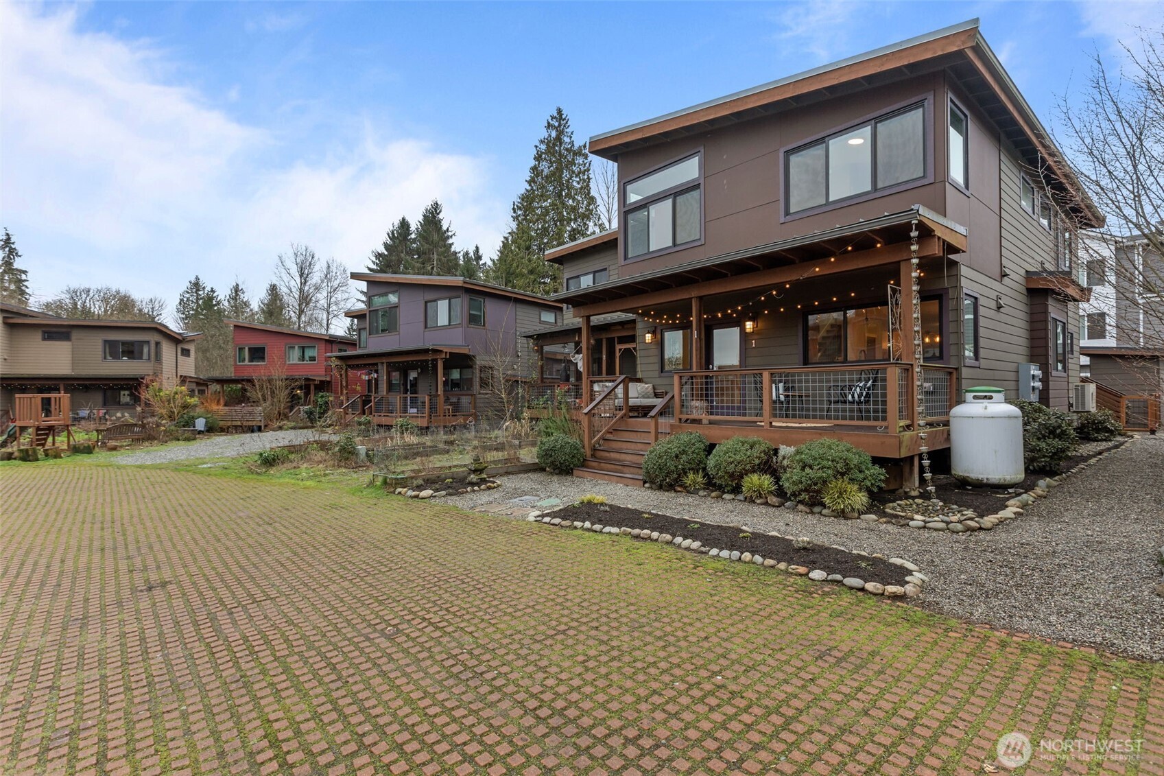 1402 194th Street Southeast, Unit 1 Bothell, WA 98012 - Photo 30 of 31 a view of a house with a patio
