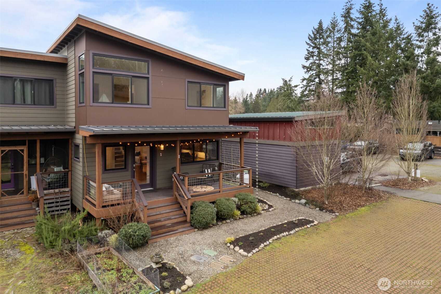 1402 194th Street Southeast, Unit 1 Bothell, WA 98012 - Photo 31 of 31 a front view of a house with garden