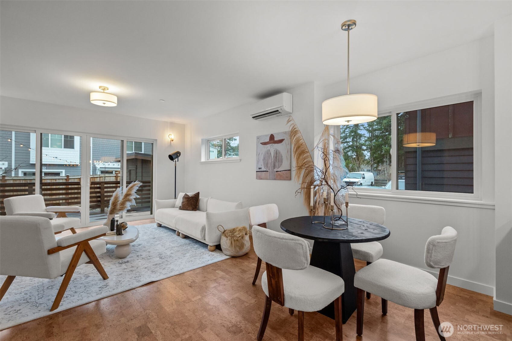 1402 194th Street Southeast, Unit 1 Bothell, WA 98012 - Photo 4 of 31 a living room with furniture and a table