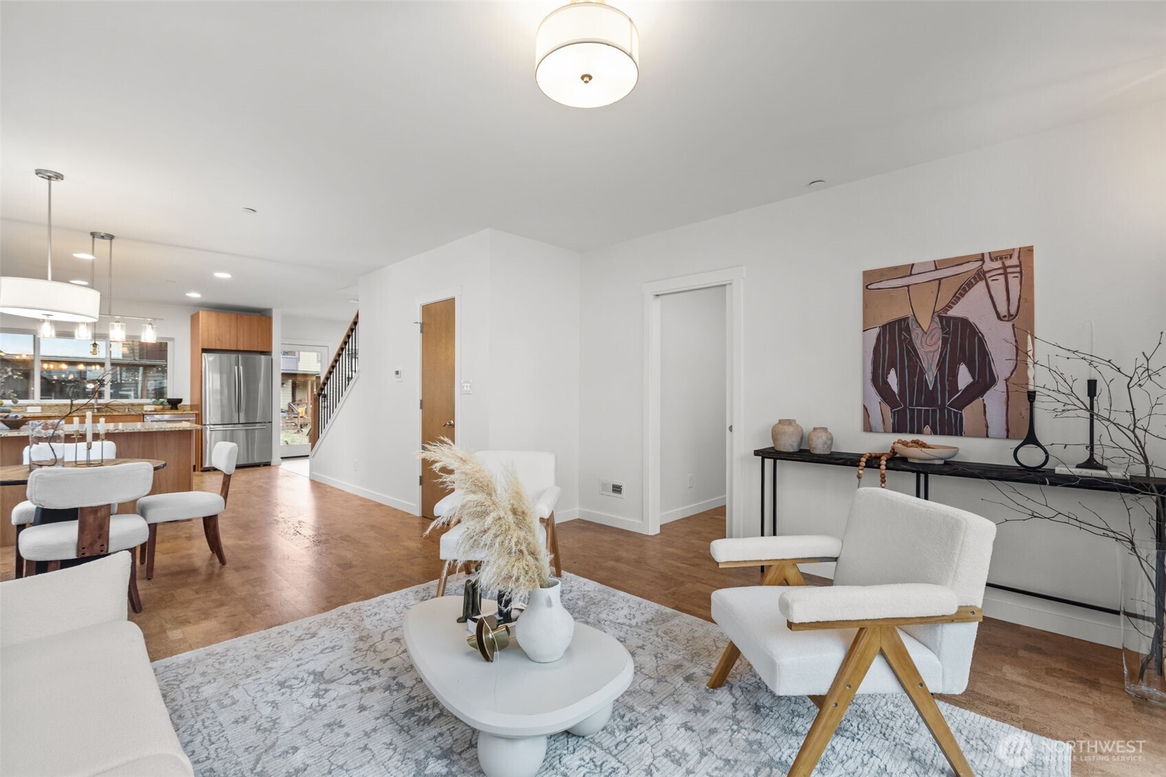 1402 194th Street Southeast, Unit 1 Bothell, WA 98012 - Photo 7 of 31 a living room with furniture and wooden floor