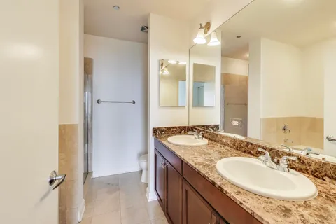 a bathroom with a bathtub and shower