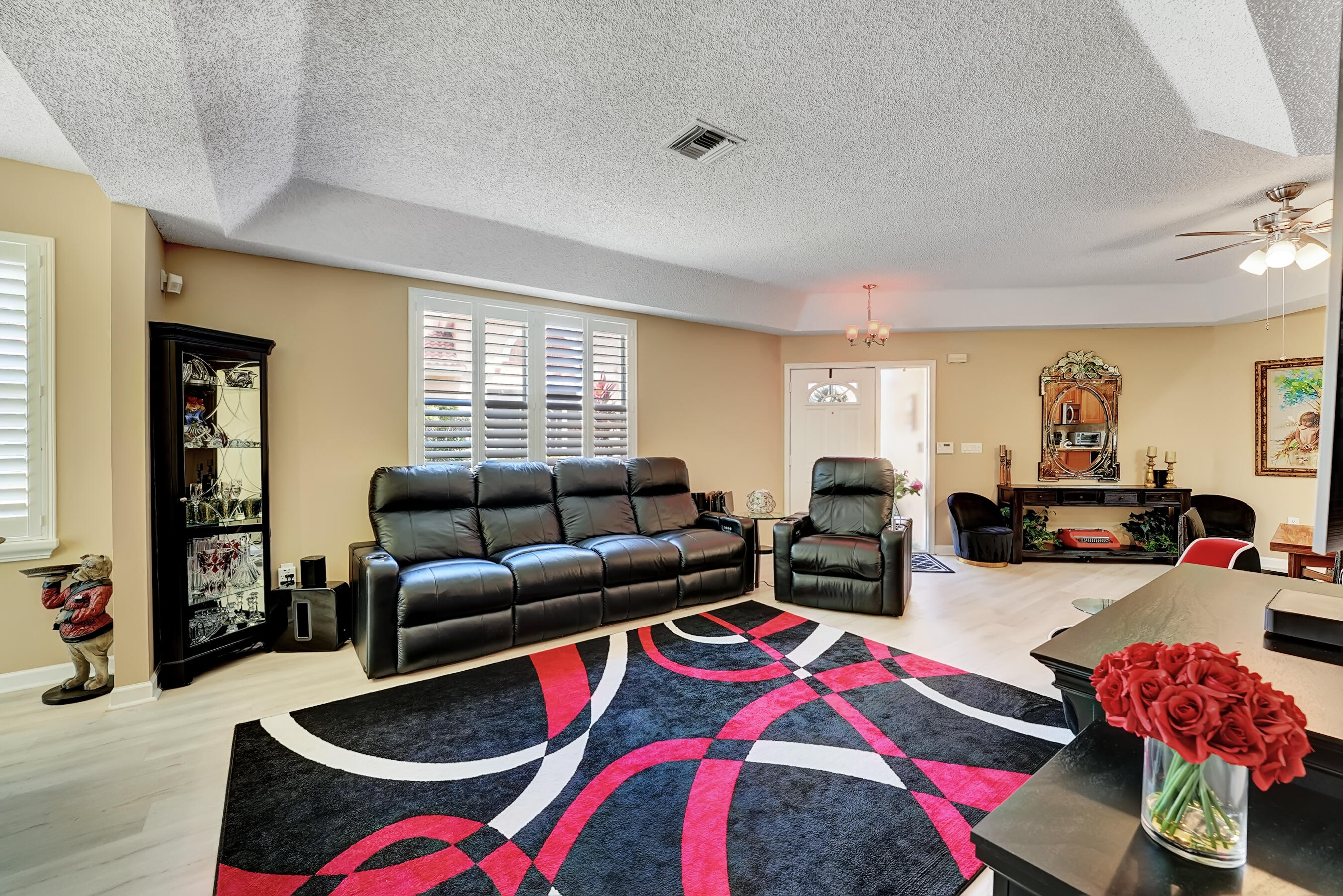 9944 Seacrest Circle, Unit D Boynton Beach, FL 33437 - Photo 11 of 35 a living room with furniture and a couch