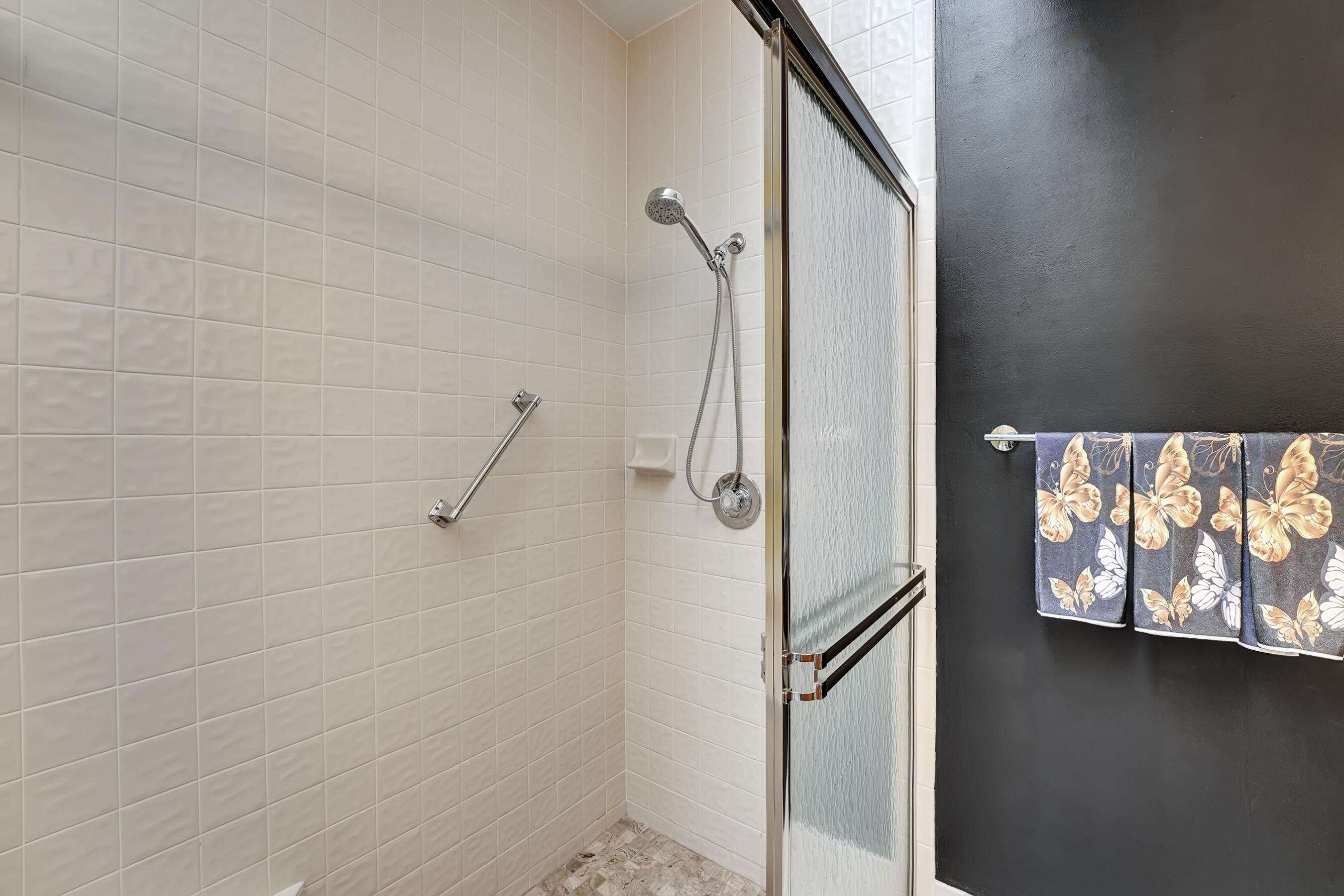 9944 Seacrest Circle, Unit D Boynton Beach, FL 33437 - Photo 18 of 35 a bathroom with a shower