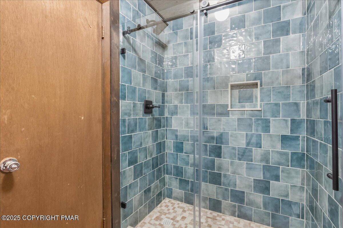 13 Sheffick Road Gouldsboro, PA 18424 - Photo 13 of 38 a bathroom with a shower