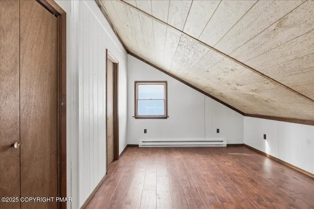 a view of wooden floor in an empty room