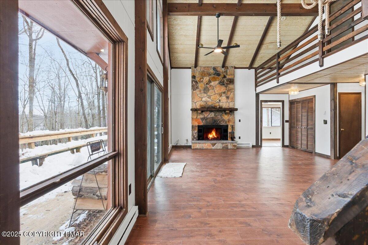 13 Sheffick Road Gouldsboro, PA 18424 - Photo 17 of 38 a view of an entryway with wooden floor and a fireplace