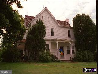 303 Newark Road Landenberg, PA 19350 - Photo 1 of 1 a front view of house with garden