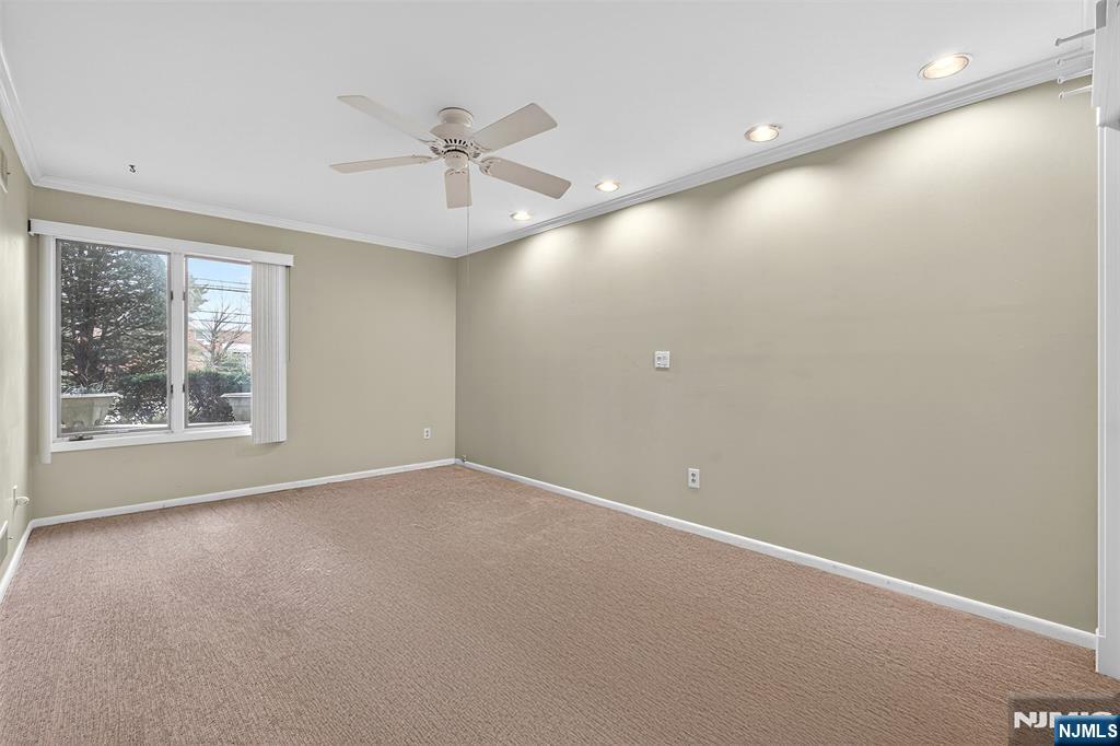 333 Liberty Street, Unit 4 Little Ferry, NJ 07643 - Photo 14 of 29 an empty room with windows and fan