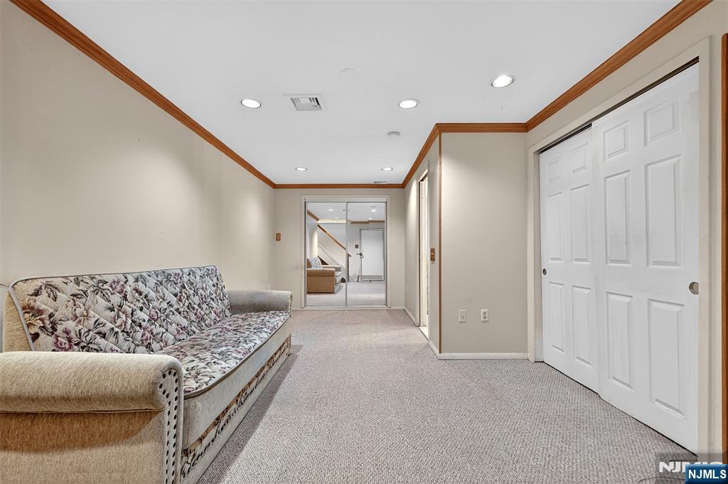 333 Liberty Street, Unit 4 Little Ferry, NJ 07643 - Photo 21 of 29 a living room with furniture and a couch