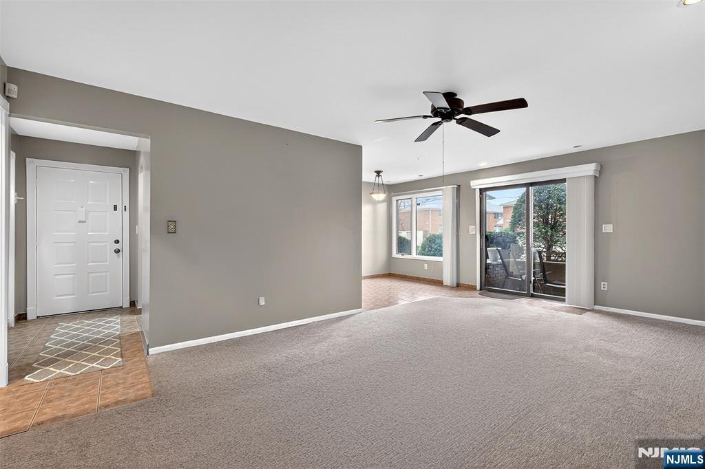 333 Liberty Street, Unit 4 Little Ferry, NJ 07643 - Photo 4 of 29 a view of a room with ceiling fan and windows