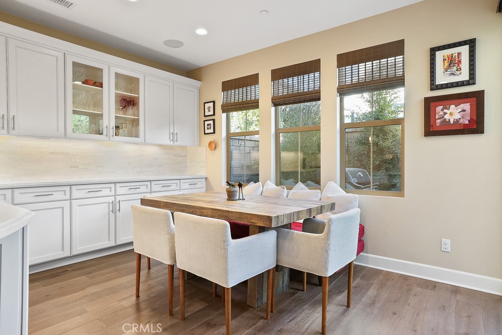 89 Lavender Lake Forest, CA 92630 - Photo 17 of 45 a dining hall with stainless steel appliances granite countertop a coffee table and chairs