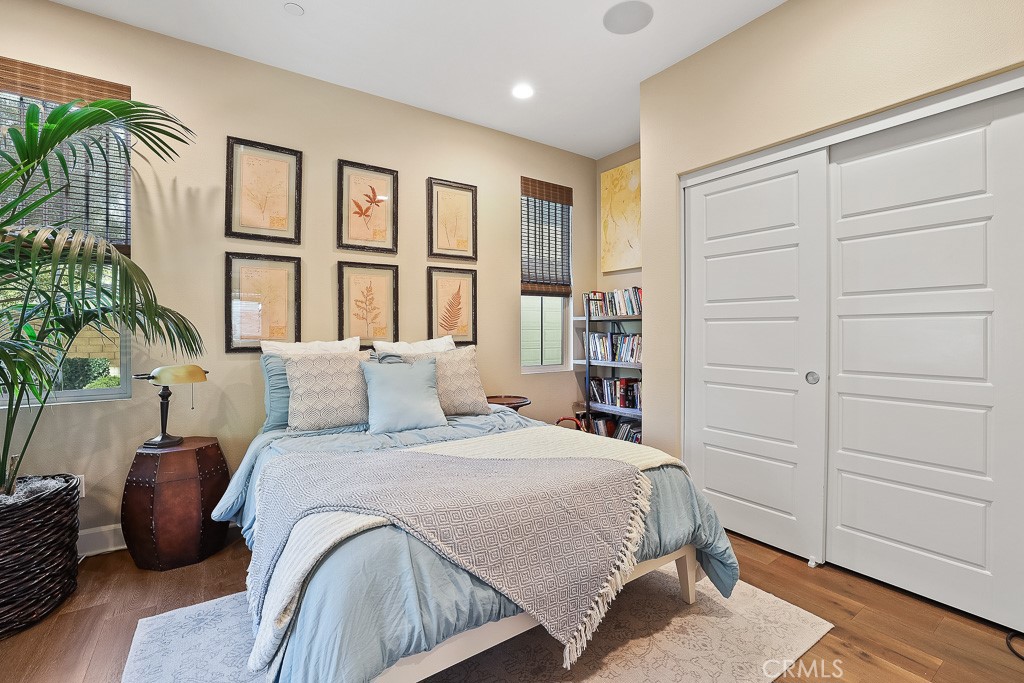 89 Lavender Lake Forest, CA 92630 - Photo 22 of 45 a bedroom with a large bed and a window
