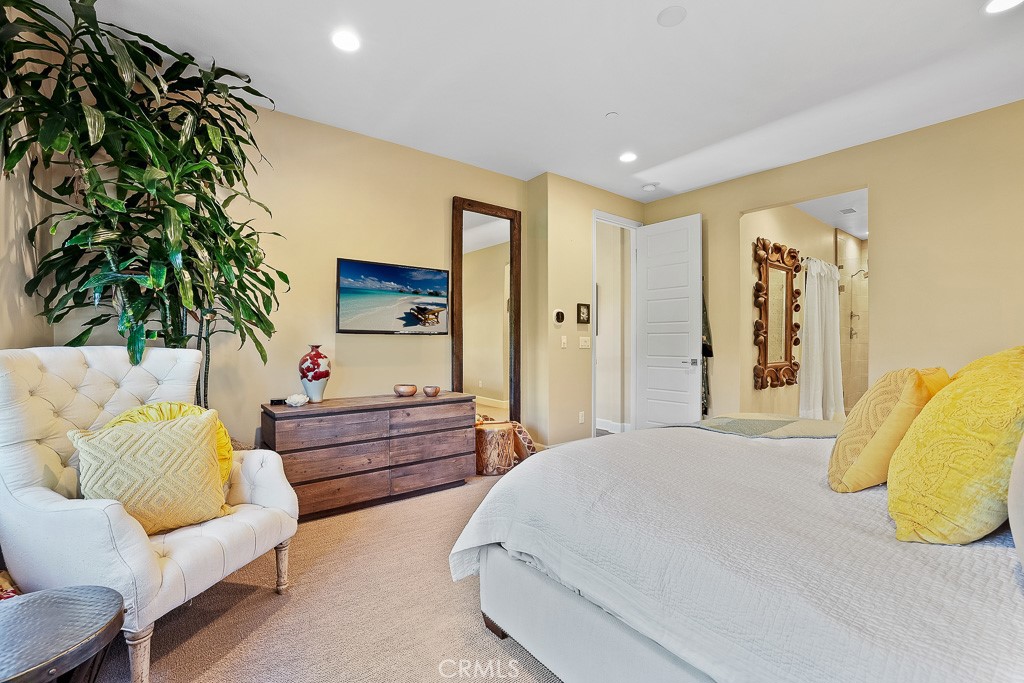 89 Lavender Lake Forest, CA 92630 - Photo 33 of 45 a bedroom with a bed and a couch