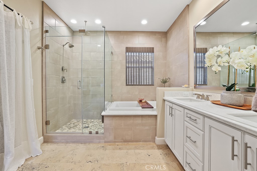 89 Lavender Lake Forest, CA 92630 - Photo 35 of 45 a bathroom with a double vanity sink mirror and shower