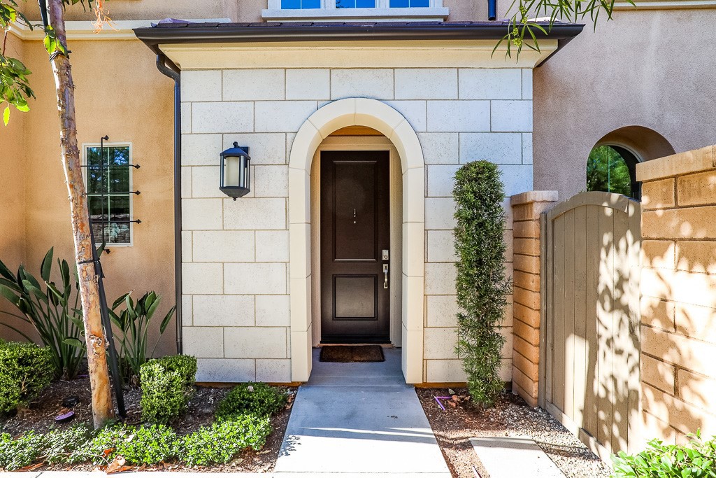 89 Lavender Lake Forest, CA 92630 - Photo 6 of 45 a view of entrance gate of a house with potted plants
