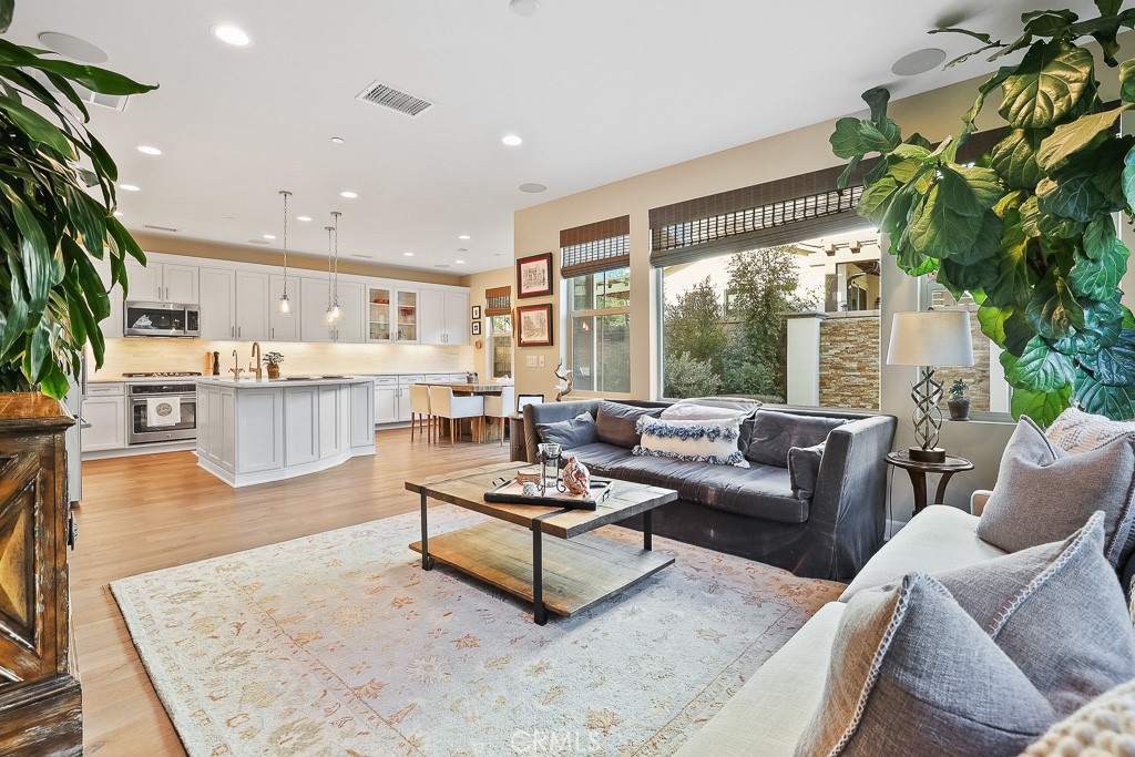 89 Lavender Lake Forest, CA 92630 - Photo 9 of 45 a living room with furniture and a large window