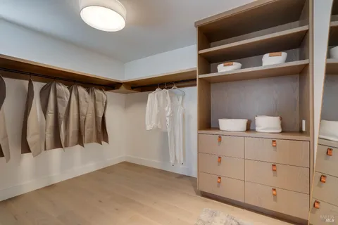 a utility room with sink dryer and washer