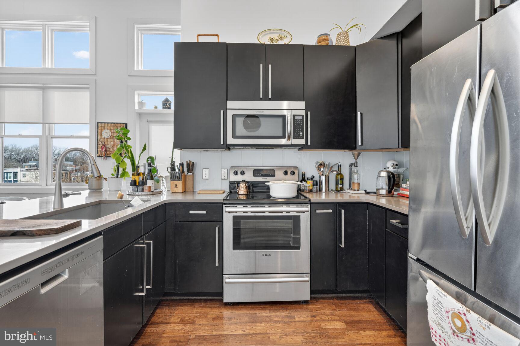 245 15th Street Southeast, Unit 403 Washington, DC 20003 - Photo 5 of 24 Open Kitchen with Stainless Steel Appliances