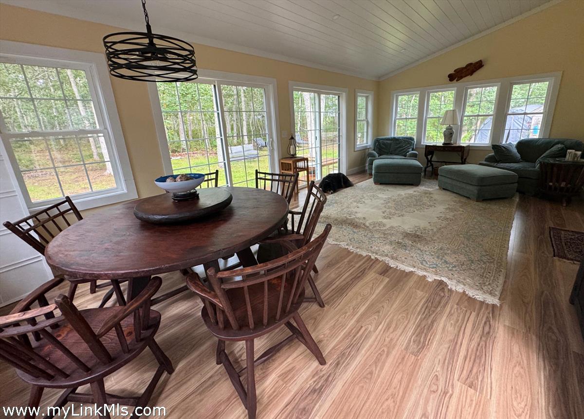 8 Old Purchase Road Edgartown, MA 02539 - Photo 13 of 26 a view of a dining room with furniture window and outside view