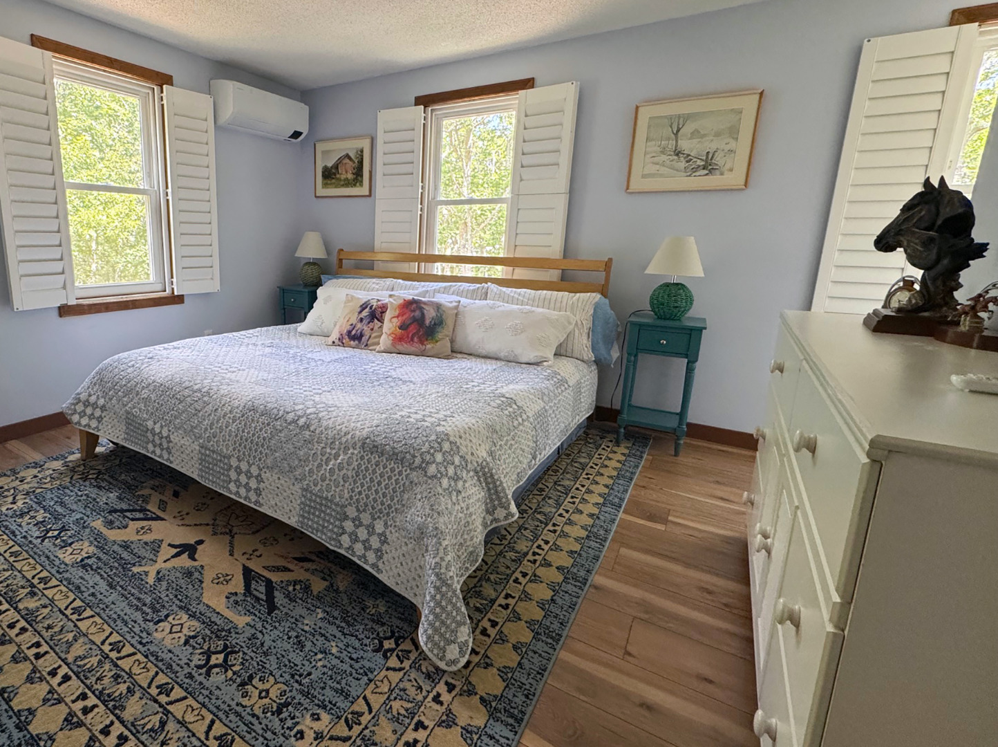 8 Old Purchase Road Edgartown, MA 02539 - Photo 18 of 26 a bedroom with a bed a painting and a window