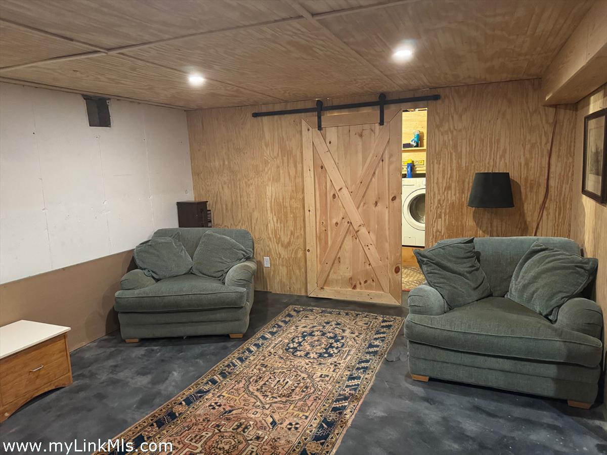 8 Old Purchase Road Edgartown, MA 02539 - Photo 23 of 26 a living room with furniture and a rug