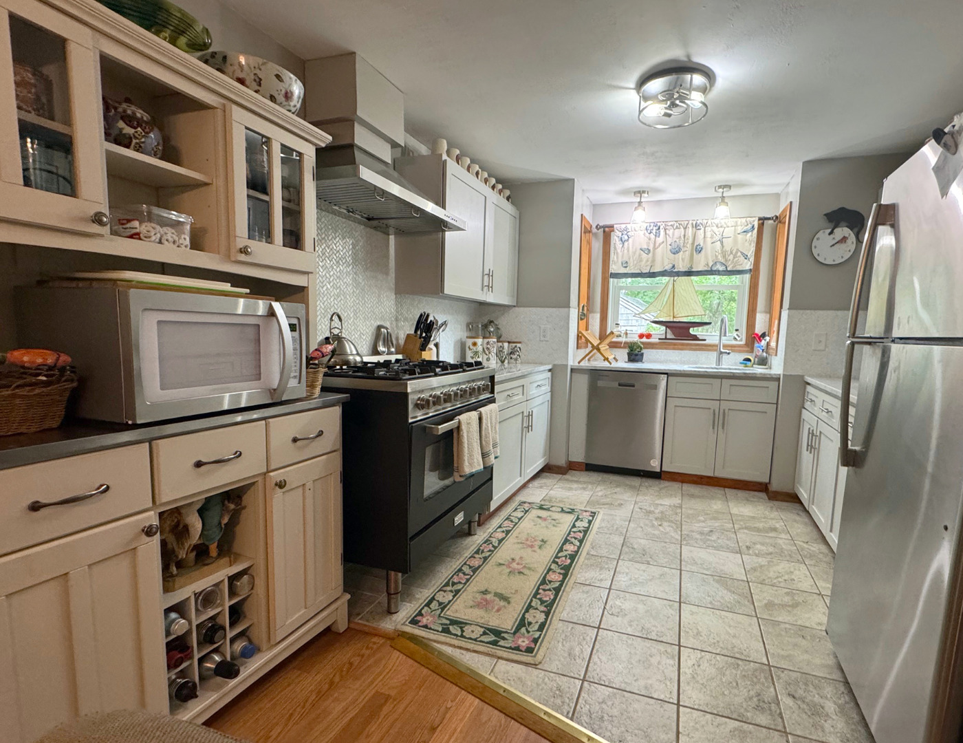 8 Old Purchase Road Edgartown, MA 02539 - Photo 8 of 26 a kitchen with stainless steel appliances granite countertop a sink stove and refrigerator