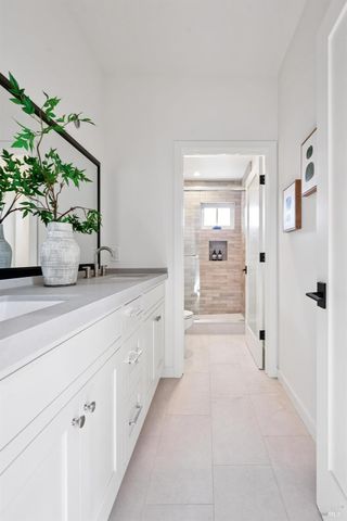 a bathroom with sink and mirror