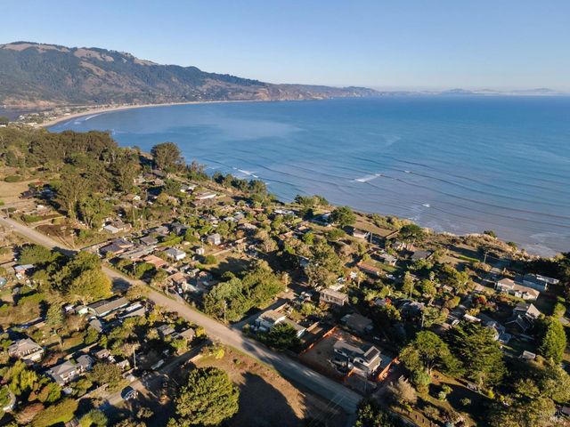 an aerial view of residential building and outdoor space