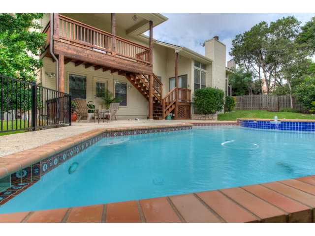 a view of a house with a swimming pool