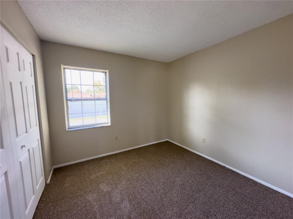 17 Spring Loop Circle Ocala, FL 34472 - Photo 11 of 20 an empty room with a window