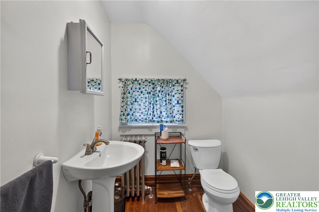 534 Ridge Street Emmaus, PA 18049 - Photo 32 of 40 a bathroom with a toilet a sink and a mirror