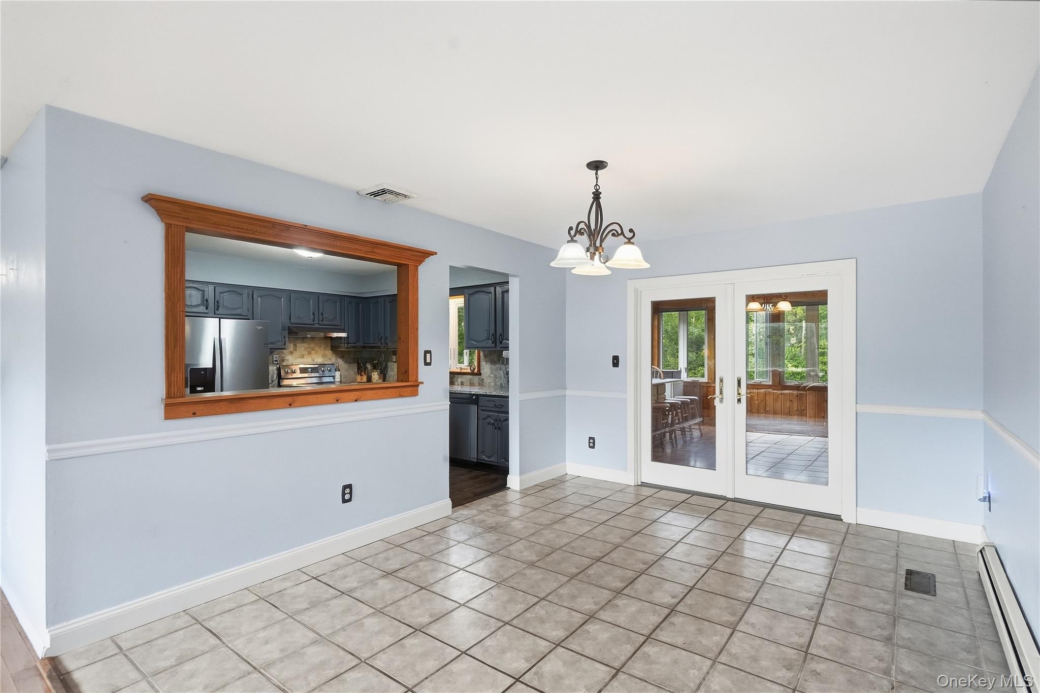 94 Booth Road Chester, NY 10918 - Photo 12 of 31 French doors lead to the three seasons room