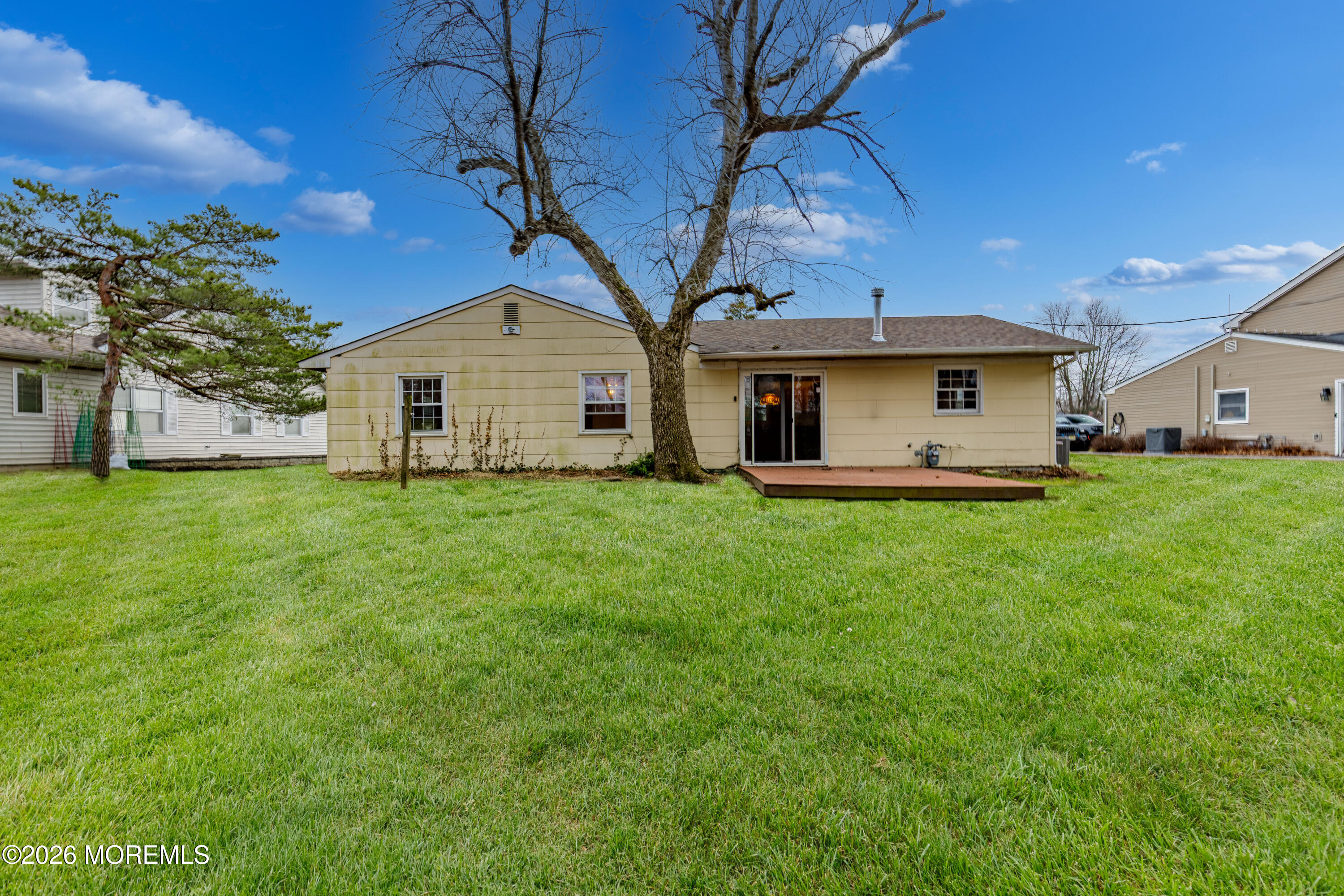 120 Andover Lane Matawan, NJ 07747 - Photo 14 of 35 a front view of a house with a yard