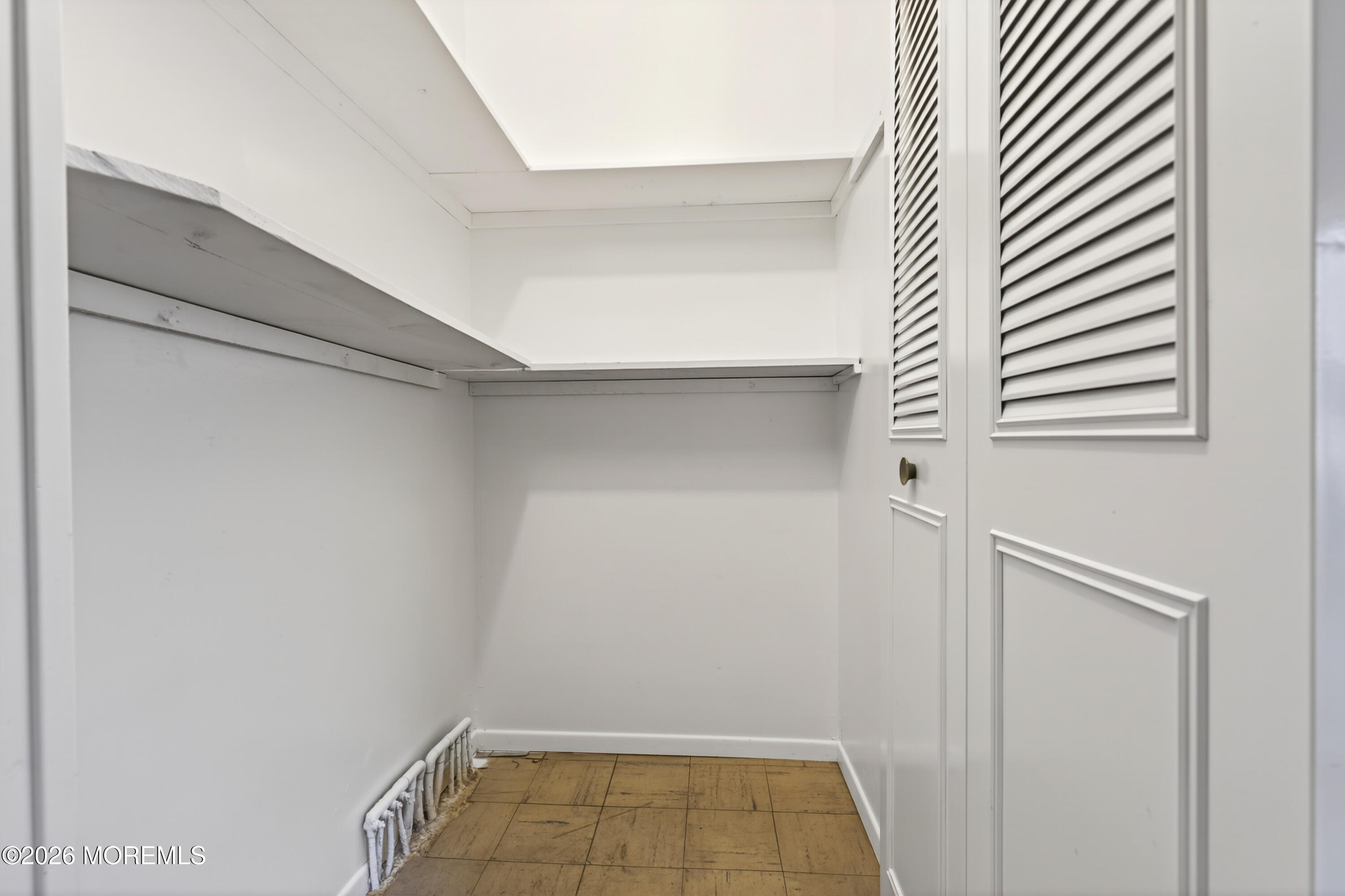 120 Andover Lane Matawan, NJ 07747 - Photo 29 of 35 a view of a room with racks on the wall
